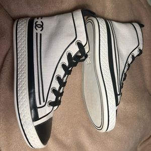 CHANEL White Canvas with leather & pearl hightop sneakers.